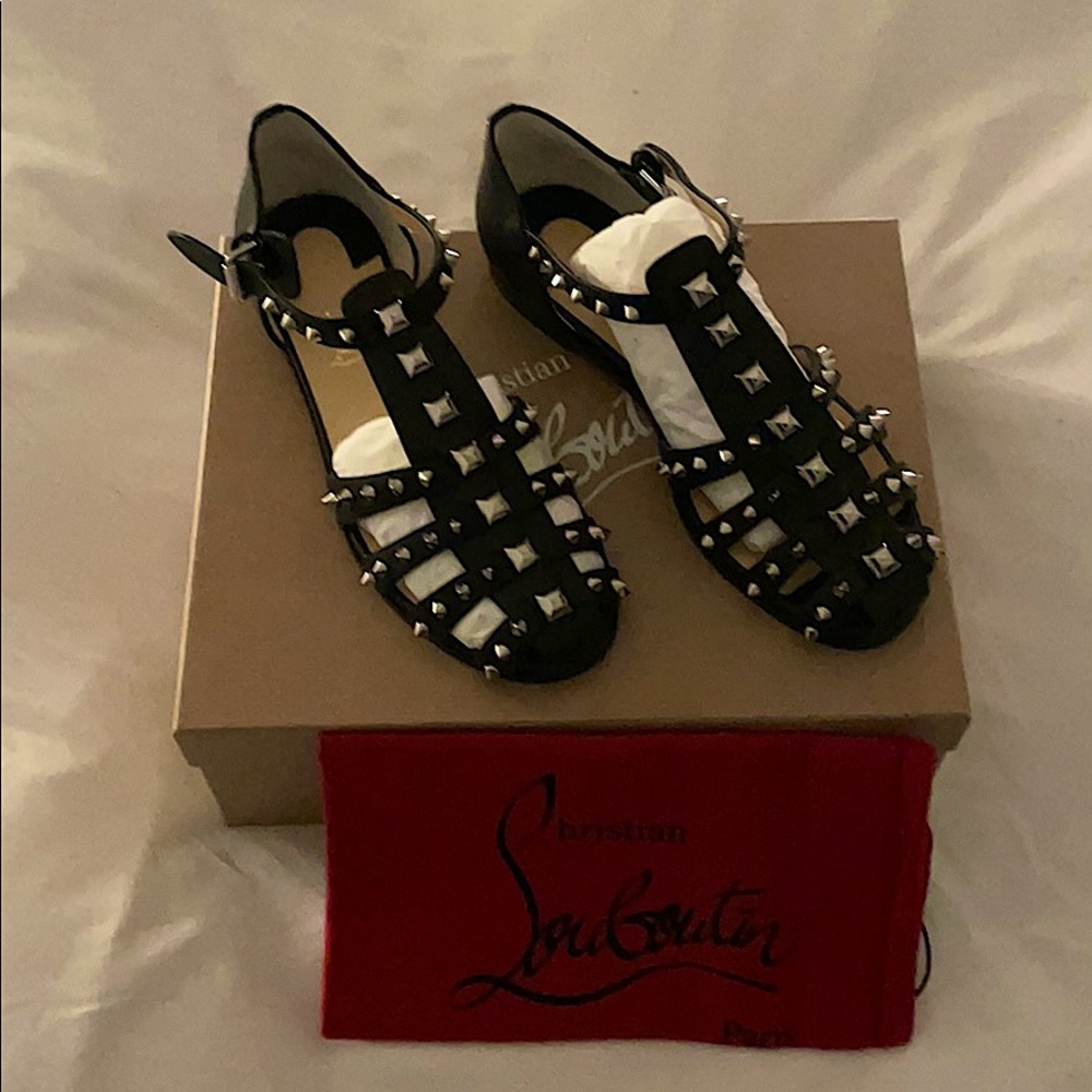 Brand new Louboutin flat black shoes!